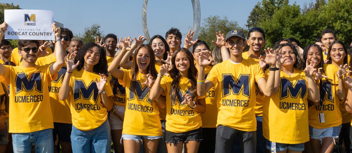 UC Merced's annual Bridge Crossing with new students posing for camera