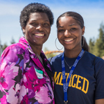 UC Merced admit and parent enjoying the campus