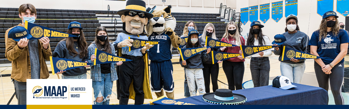 high school students posing with mascots getting accepted into uc merced