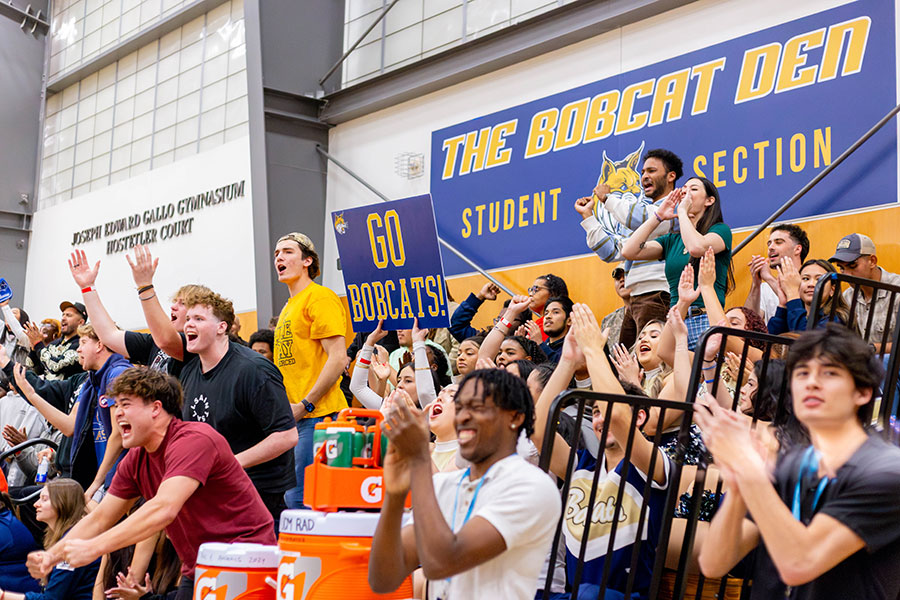 UC Merced students cheering on the basketball team.